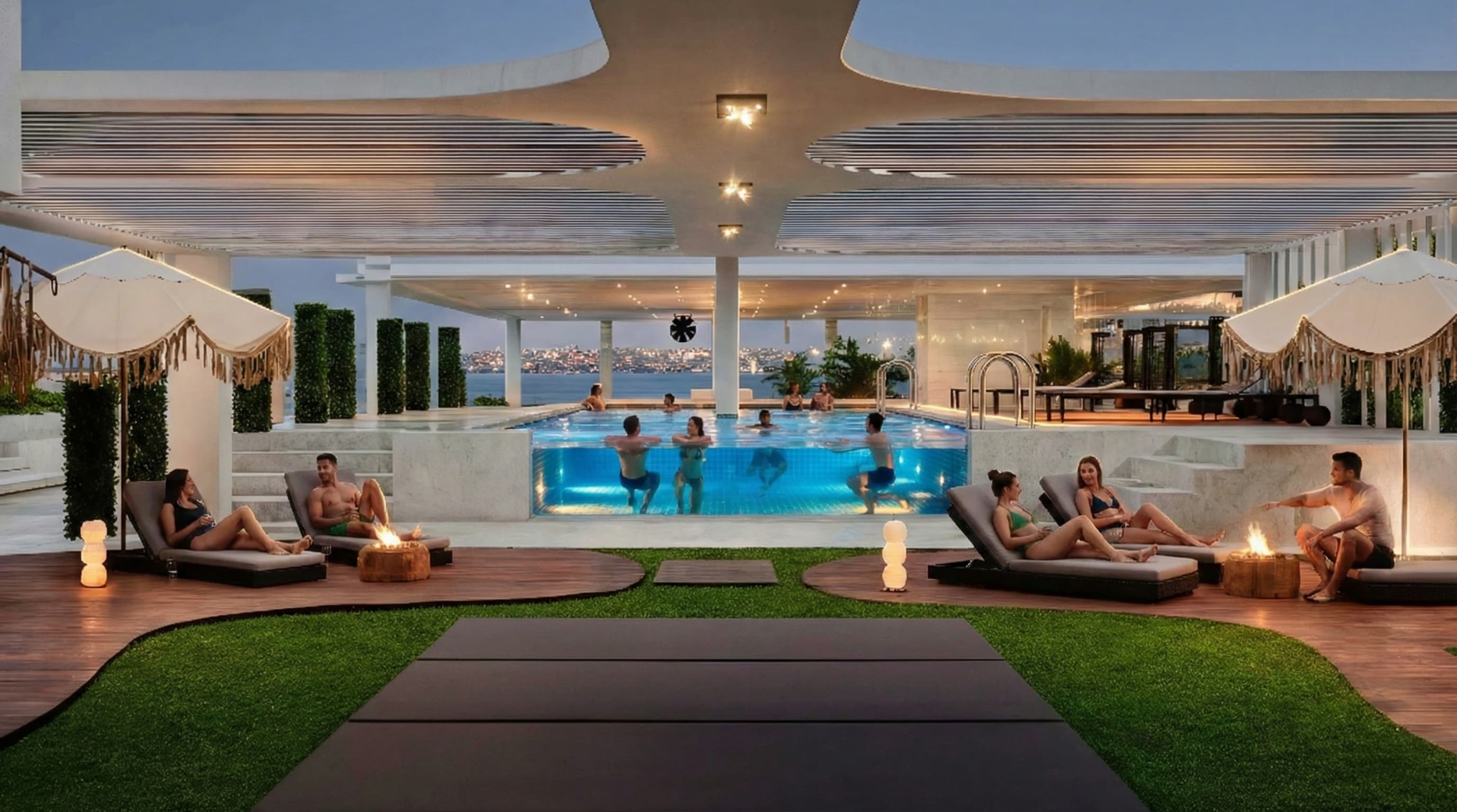 The pool decks at ground level, with loungers and palms